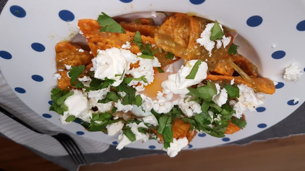 Fried Eggs and Green Salsa on Tortilla Chips (Chilaquiles)