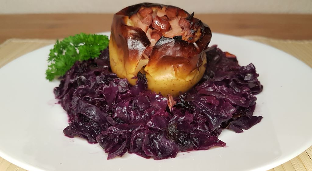 Cranberry and Bacon Stuffed Apple on Red Cabbage